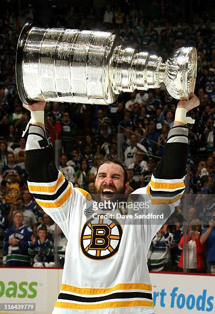Zdeno Chara of the Boston Bruins celebrates as he lifts the Stanley Cup after his team defeated the Vancouver Canucks 4-0 in Game Seven of the 2011...