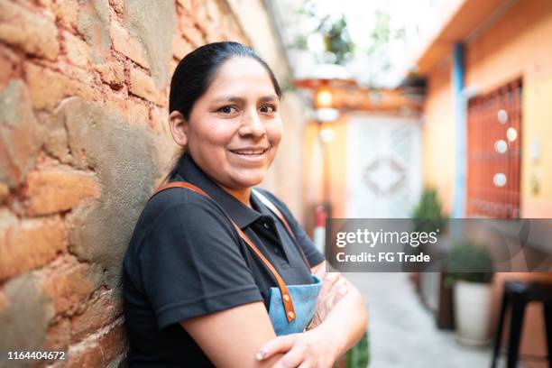 portrait of restaurant owner looking at camera - boss over shoulder stock pictures, royalty-free photos & images