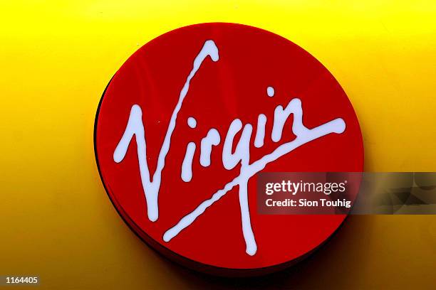 The Virgin logo over the entrance to a Virgin Megastore SEptember 20, 2001 on Oxford Street in London. The companies airline, Virgin Atlantic, has...