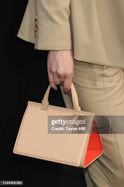 Laura Prepon, purse detail, attends the "Orange is the New Black" final season world premiere at Alice Tully Hall, Lincoln Center on July 25, 2019 in...