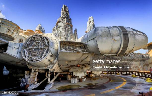 Scenes of the Millennium Falcon at Black Spire Outpost during a sneak peek for invited guests of the Star Wars: Galaxys Edge attraction at Disneys...