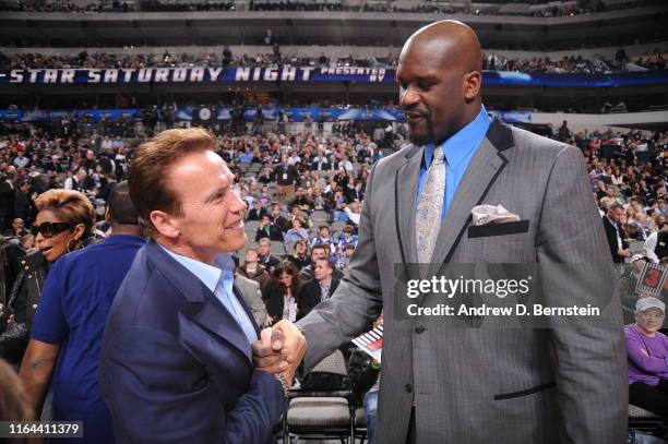 February 13: Arnold Schwarzenegger shakes hands with Shaquille O'Neal during the Haier Shooting Stars Competition as part of All Star Saturday Night...