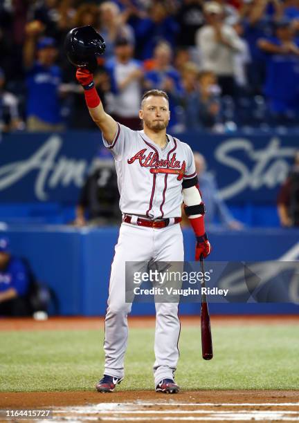Josh Donaldson of the Atlanta Braves acknowledges applause from the crowd prior to his first at bat in the first inning of an MLB game against the...