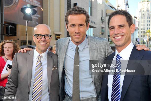 Producer Donald De Line, actor Ryan Reynolds and producer Greg Berlanti arrives at the premiere of Warner Bros. Pictures' "Green Lantern" held at...
