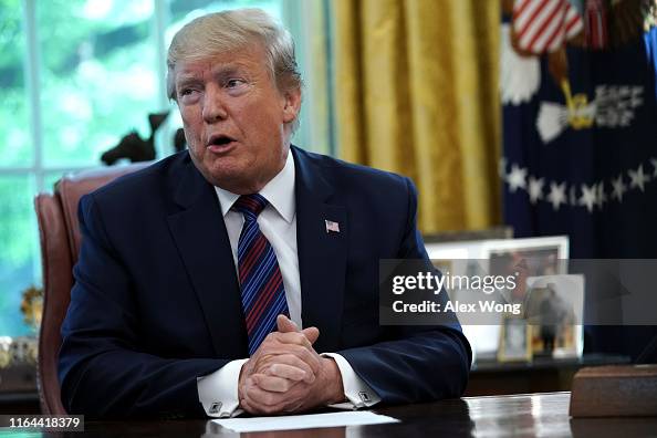 President Trump Speaks To Reporters In The Oval Office President Trump Speaks To Reporters In The Oval Office