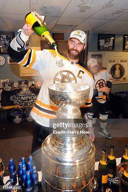 Zdeno Chara of the Boston Bruins celebrates in the locker room after defeating the Vancouver Canucks in Game Seven of the 2011 NHL Stanley Cup Final...