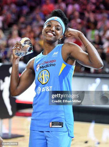 Diamond DeShields of the Chicago Sky reacts after accepting the trophy for winning the Skills Challenge of the WNBA All-Star Friday Night at the...