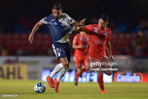 Franco Jara of Pachuca fights for the ball with Jesus Paganoni of Veracruz during the 2nd round match between Veracruz and Pachuca as part of the...