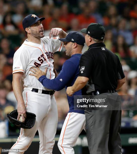 Justin Verlander of the Houston Astros reacts after being ejected from the game in the sixth inning against the Tampa Bay Rays at Minute Maid Park on...