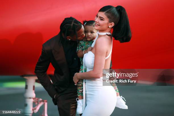 Travis Scott, Stormi Webster, and Kylie Jenner attend the premiere of Netflix's "Travis Scott: Look Mom I Can Fly" at Barker Hangar on August 27,...