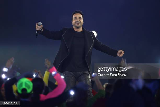 Puerto Rican singer Luis Fonsi performs during the opening ceremony of Lima 2019 Pan American Games at Estadio Nacional on July 26, 2019 in Lima,...