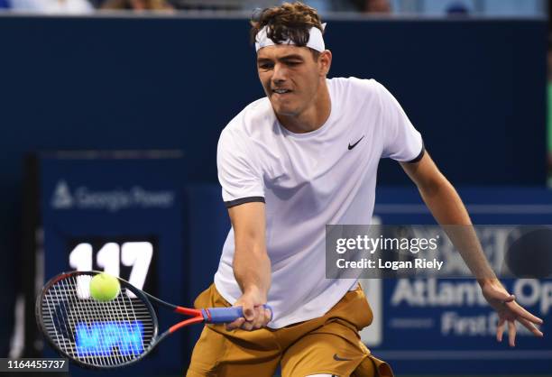 Taylor Fritz returns a forehand to Miomir Kecmanovic of Serbia during the BB&T Atlanta Open at Atlantic Station on July 26, 2019 in Atlanta, Georgia.