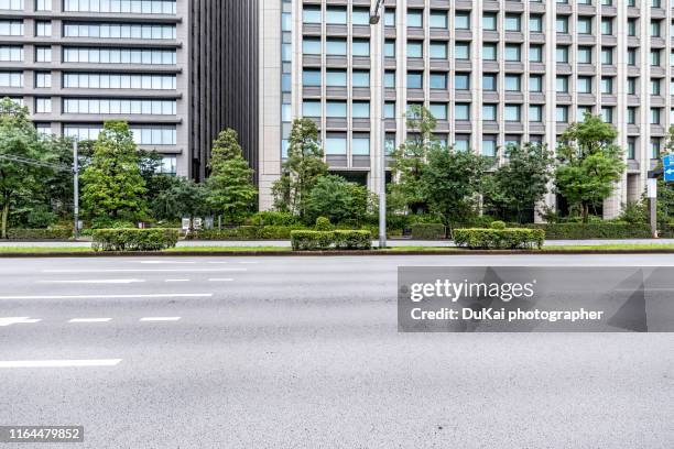 inner city road in tokyo - horizontal road stock pictures, royalty-free photos & images