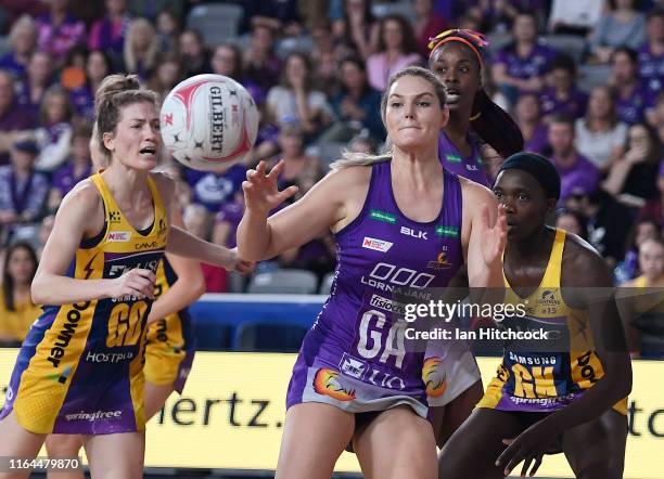 Gretal Tippett of the Firebirds looks to catch the ball during the round 10 Super Netball match between the Firebirds and the Lightning at Brisbane...