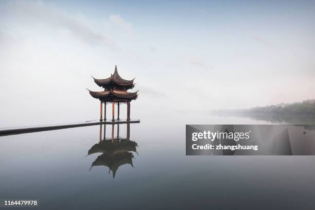 jixian pavilion of hangzhou west lake, china - classical chinese garden fotografías e imágenes de stock