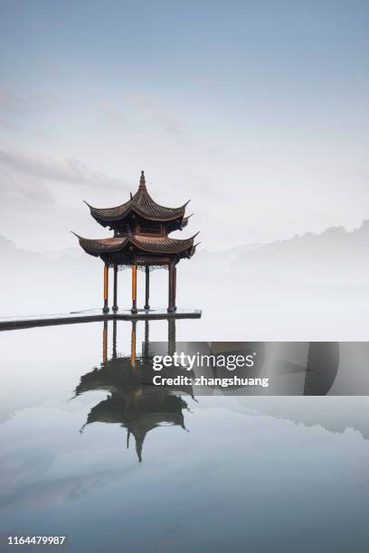 jixian pavilion of hangzhou west lake, china - painted roof stock pictures, royalty-free photos & images