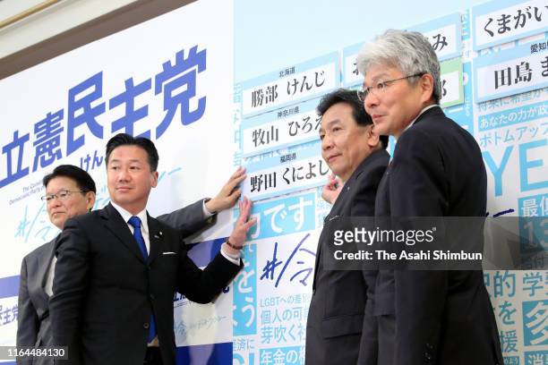 Constitutional Democratic Party of Japan leader Yukio Edano poses for photographs during a press conference after the Upper House election on July...