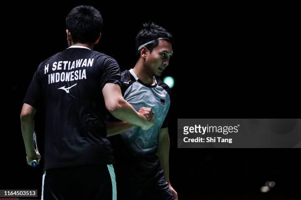 Mohammad Ahsan and Hendra Setiawan of Indonesia celebrate the victory in the Men's Doubles semi finals match against Takeshi Kamura and Keigo Sonoda...