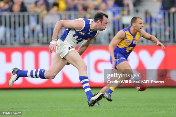 Todd Goldstein of the Kangaroos chases the ball during the round 19 AFL match between the West Coast Eagles and the North Melbourne Kangaroos at...