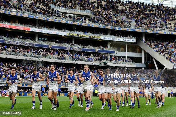 The Kangaroos leaves the field at the main break during the round 19 AFL match between the West Coast Eagles and the North Melbourne Kangaroos at...