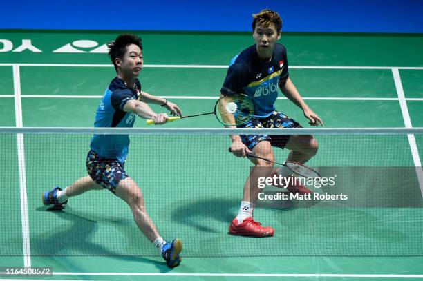 Marcus Fernaldi Gideon and Kevin Sanjaya Sukamuljo of Indonesia compete in the Men's Doubles semifinal match against Li Jun Hui and Liu Yu Chen of...