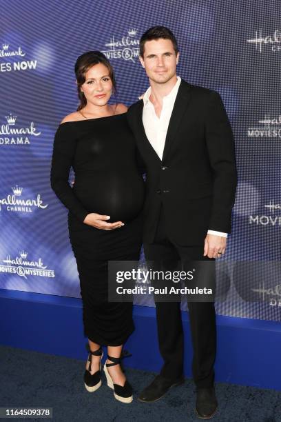 Actors Italia Ricci and Robbie Amell attend the Hallmark Channel and Hallmark Movies & Mysteries summer 2019 TCA press tour event at a Private...