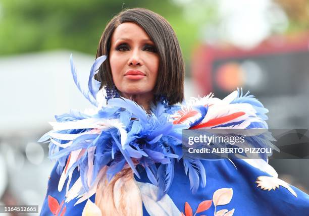 Somali-American fashion model and actress, Zara Mohamed Abdulmajid, known as Iman, poses as she arrives for the opening ceremony and the screening of...