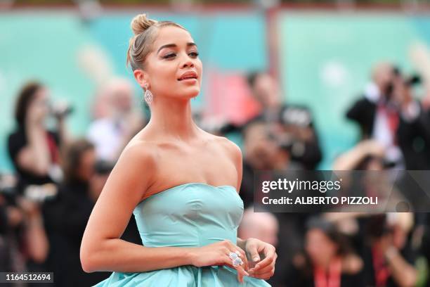 German-US model and fashion influencer Jasmine Sanders, aka Golden Barbie poses as she arrives for the opening ceremony and the screening of the film...