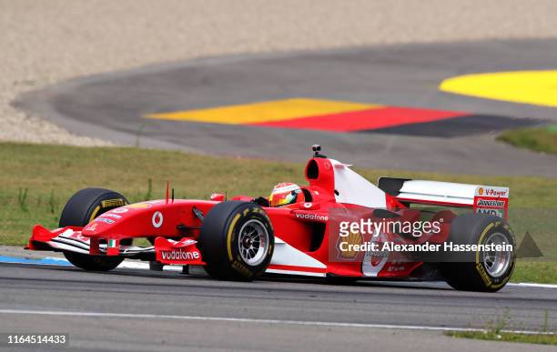 Mick Schumacher of Germany drives the Ferrari F2004 of his father Michael Schumacher on track after final practice for the F1 Grand Prix of Germany...