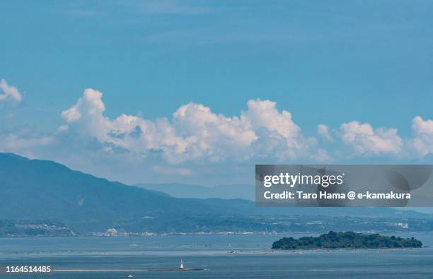 summer clouds on the mountain by the bay in japan - 鹿児島 ストックフォトと画像