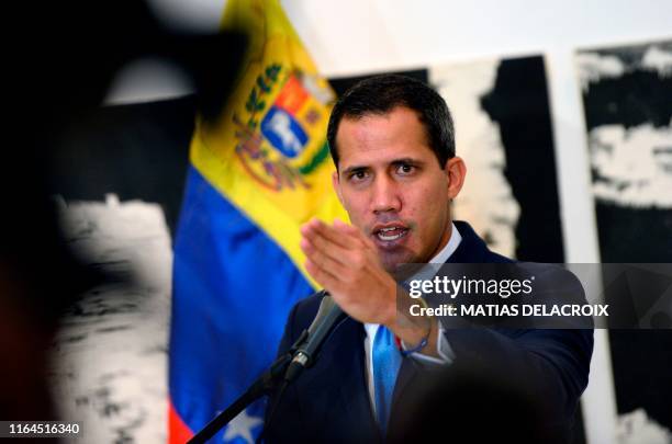 Venezuela's National Assembly leader and self-proclaimed acting president Juan Guaido, speaks during a press conference at the Metropolitan...