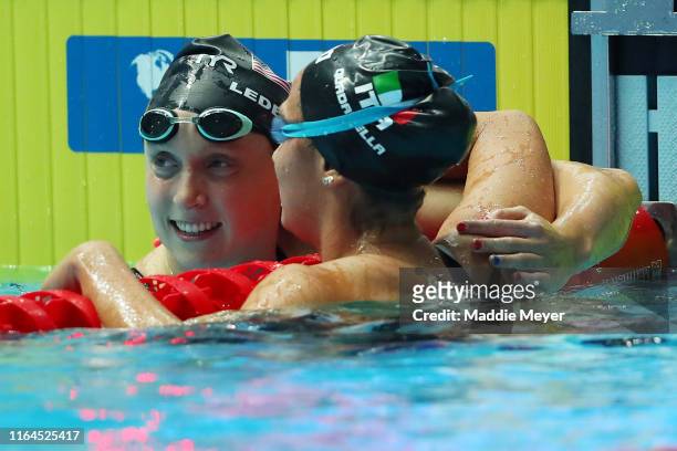 Katie Ledecky of the United States is congratulated by Simona Quadarella of Italy after winning the Women's 800m Freestyle Final on day seven of the...