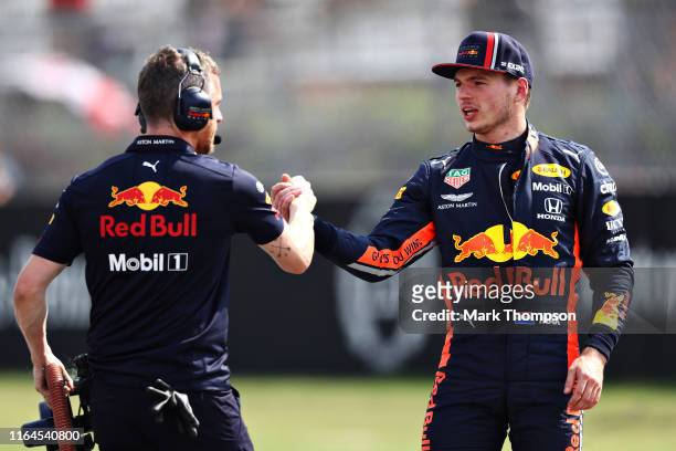 Second place qualifier Max Verstappen of Netherlands and Red Bull Racing celebrates in parc ferme during qualifying for the F1 Grand Prix of Germany...