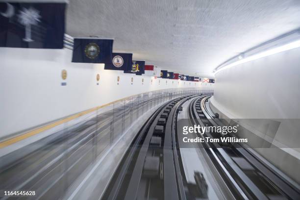 Rails of the senate subway are pictured during congressional recess on Wednesday, August 28, 2019.
