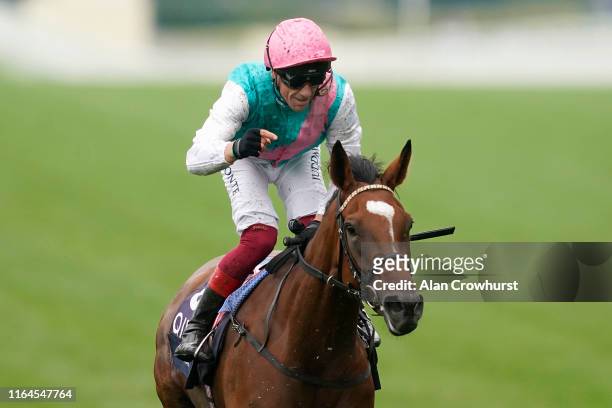 Frankie Dettori riding Enable celebrates after winning The King George VI And Queen Elizabeth Qipco Stakes at Ascot Racecourse on July 27, 2019 in...