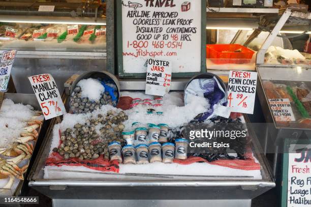 Seafood for sale at Seattle's historic Pike Place market which has been in operation since 1907 and is one of the oldest continuously run farmers...