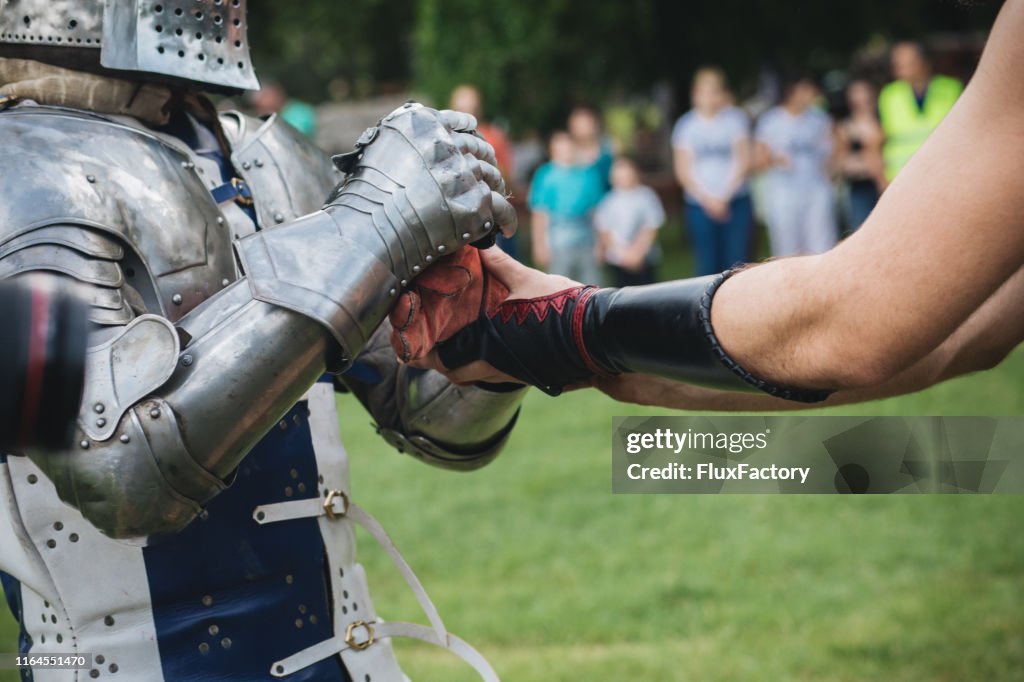 Knight and a squire on a traditional festival