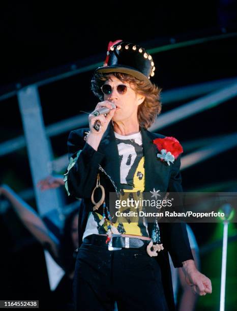 Mick Jagger performing on stage during the first concert of the Rolling Stones Voodoo Lounge World Tour at the Robert F Kennedy Memorial Stadium in...