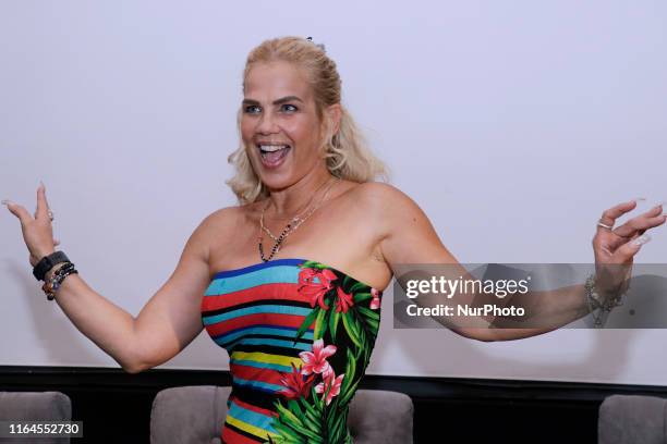 Niurka Marcos poses for photos during a press conference to promote ' Alma de Angel ' TV Series at Televisa San Angel on August 27, 2019 in Mexico...