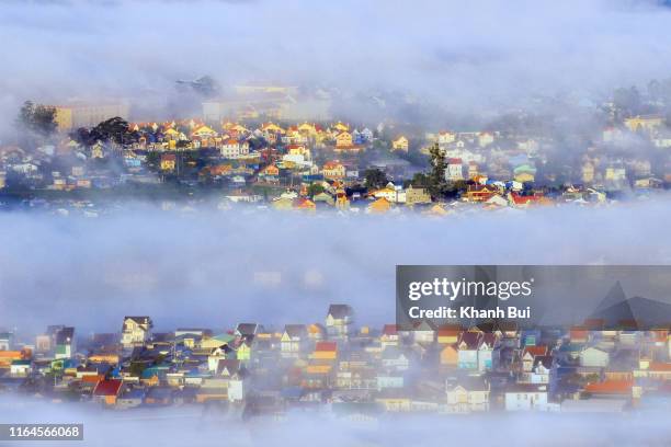 city of the fog with brilliant houses and magic light and fog at sunrise - czech republic mountains stock pictures, royalty-free photos & images