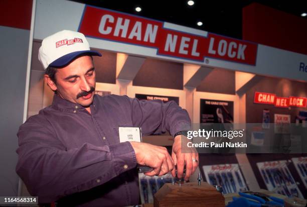 Country and western music singer Aaron Tippin appears at the National Hardware Show in the Channel Lock booth at McCormick Place in Chicago,...