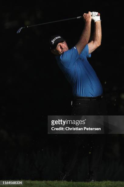 Rod Pampling plays a tee shot on the 16th hole during the continuation second round of the Barracuda Championship at Montreux Country Club on July...