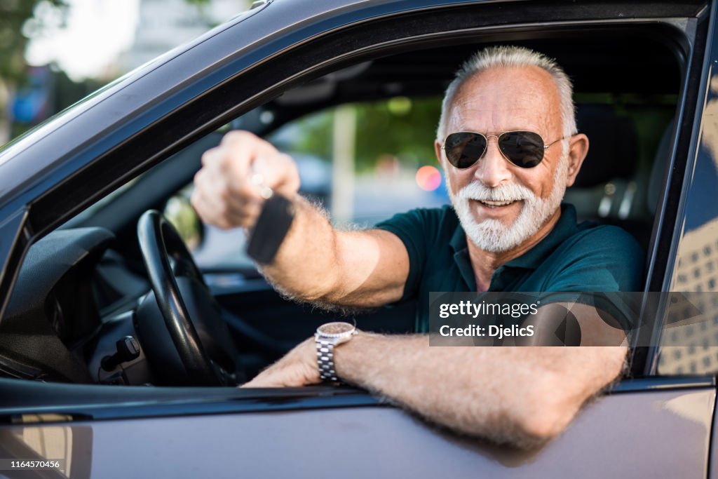 Happy Senior Man Just Bought His New Car High-Res Stock Photo - Getty ...