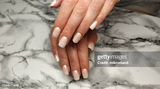 close-up of woman fingers with nail art manicure - artificial nails stock pictures, royalty-free photos & images