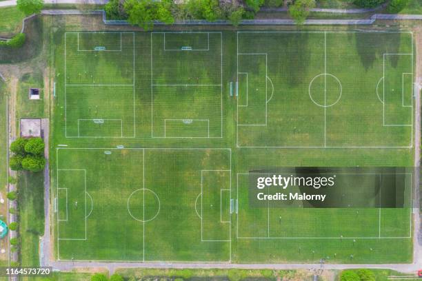 aerial view of multiple soccer fields. - soccer field outline stock pictures, royalty-free photos & images