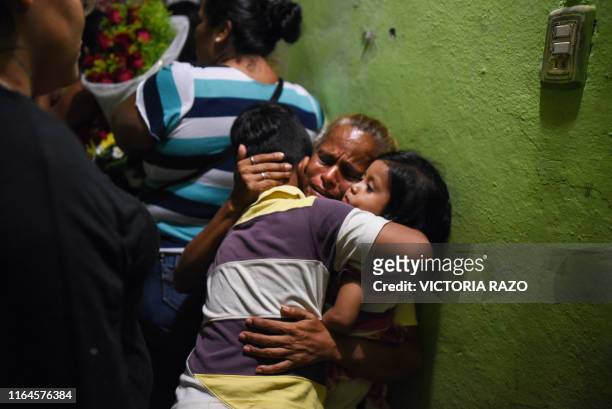 America del Carmen Gomez cries at the wake of her daughter Xochitl Nayeli Irineo Gomez one of the victims of the attack at the Caballo Blanco bar, on...