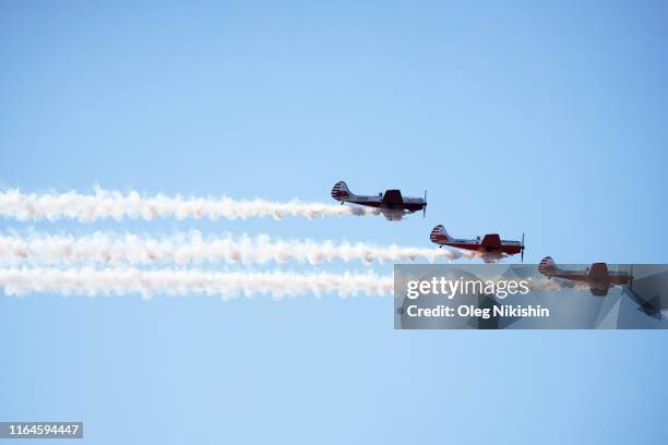 Aerobatic team perform a flying exhibition during the MAKS International Aviation and Space Salon at Zhukovskiy International Airport on August 29,...