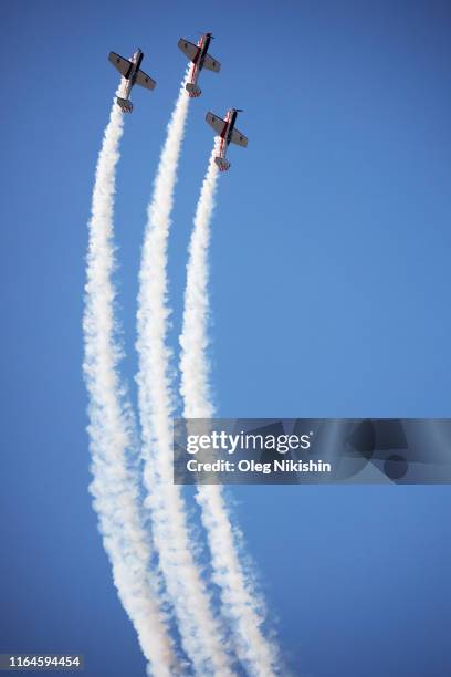 Aerobatic team perform a flying exhibition during the MAKS International Aviation and Space Salon at Zhukovskiy International Airport on August 29,...