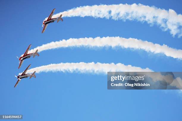 Aerobatic team perform a flying exhibition during the MAKS International Aviation and Space Salon at Zhukovskiy International Airport on August 29,...