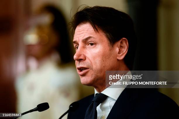 Italys Prime Minister Giuseppe Conte addresses the media following a meeting with the Italian president, after he was given a mandate to form a new...